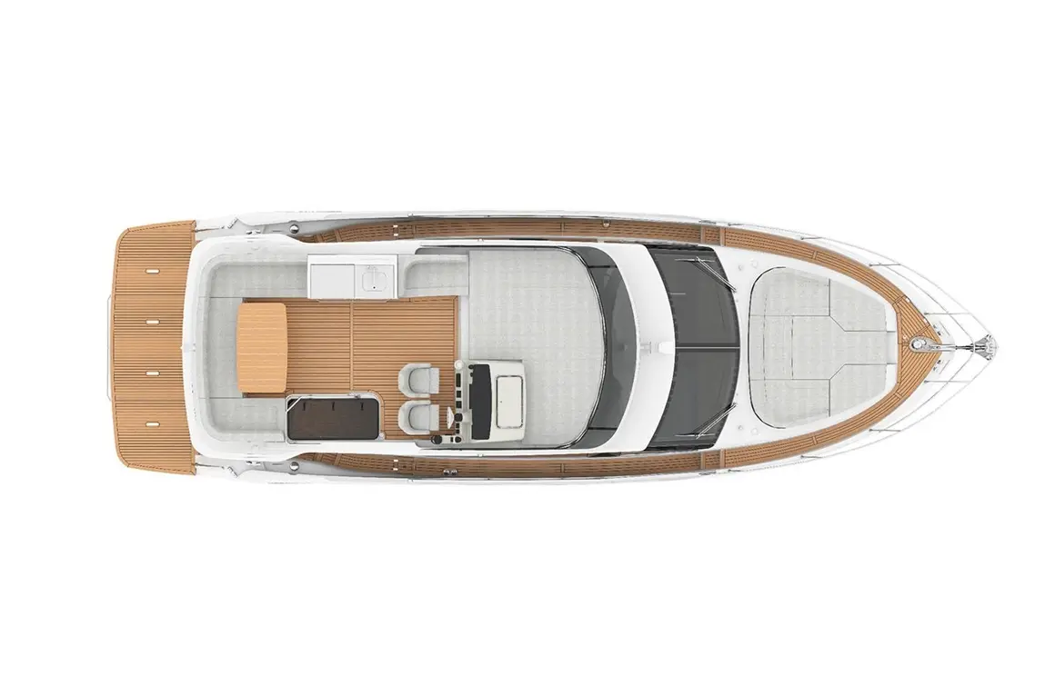 Top view of a modern yacht deck featuring seating, a table, and a helm, surrounded by wooden decking and a smooth layout.
